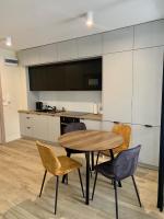 Kuchyň nebo kuchyňský kout v ubytování APARTAMENTY PIANO POLNA 28