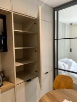 Postel nebo postele na pokoji v ubytování APARTAMENTY PIANO POLNA 28