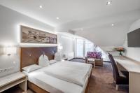 Posteľ alebo postele v izbe v ubytovaní Hotel Garni Christine