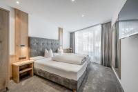 Posteľ alebo postele v izbe v ubytovaní Hotel Garni Christine