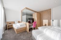 Posteľ alebo postele v izbe v ubytovaní Hotel Garni Christine