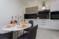 Kuchyňa alebo kuchynka v ubytovaní Bloom Apartment