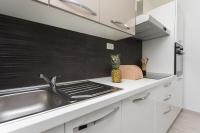 Kuchyňa alebo kuchynka v ubytovaní Bloom Apartment