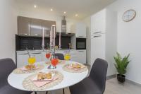 Kuchyňa alebo kuchynka v ubytovaní Bloom Apartment