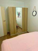 Posteľ alebo postele v izbe v ubytovaní Apartament Zen