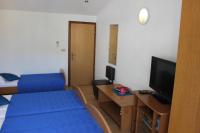 TV a/nebo společenská místnost v ubytování Guesthouse San Antonio