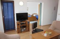 TV a/nebo společenská místnost v ubytování Guesthouse San Antonio