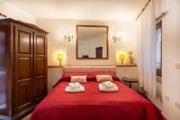 A bed or beds in a room at Ca' Longhi