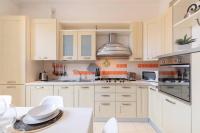 Kuchyňa alebo kuchynka v ubytovaní Elegant Aparment Vittorio City Center