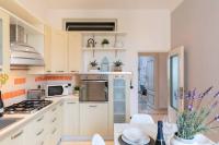 Kuchyňa alebo kuchynka v ubytovaní Elegant Aparment Vittorio City Center