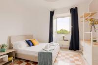 Posteľ alebo postele v izbe v ubytovaní Elegant Aparment Vittorio City Center
