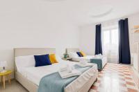 Posteľ alebo postele v izbe v ubytovaní Elegant Aparment Vittorio City Center