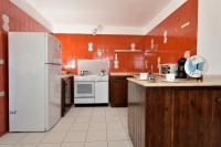 A kitchen or kitchenette at Villa Orrì