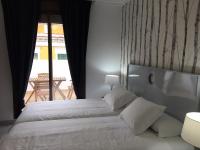Postel nebo postele na pokoji v ubytování Correduria Premium Apartments