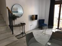 Posezení v ubytování Correduria Premium Apartments