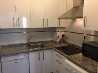 Kuchyň nebo kuchyňský kout v ubytování Correduria Premium Apartments