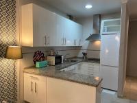 Kuchyň nebo kuchyňský kout v ubytování Correduria Premium Apartments