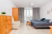 Posteľ alebo postele v izbe v ubytovaní Duplex Apartment near the Airport by Noclegi Renters