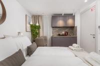 Posteľ alebo postele v izbe v ubytovaní Main Street apartments