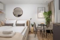 Posteľ alebo postele v izbe v ubytovaní Main Street apartments