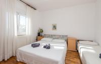 Łóżko lub łóżka w pokoju w obiekcie House Noa