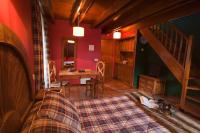 Postel nebo postele na pokoji v ubytování GRAN CHALET Hotel & Petit SPA