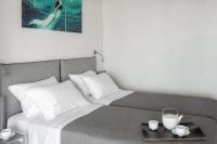 Posteľ alebo postele v izbe v ubytovaní The Mykonist Executive Villa Elia Beach