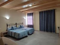 Postel nebo postele na pokoji v ubytování Hotel Novo