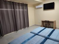 Postel nebo postele na pokoji v ubytování Hotel Novo
