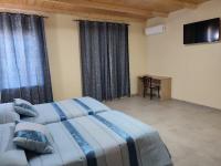 Postel nebo postele na pokoji v ubytování Hotel Novo