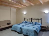 Postel nebo postele na pokoji v ubytování Hotel Novo
