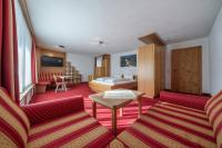 Łóżko lub łóżka w pokoju w obiekcie Hotel Similaun