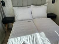 Postel nebo postele na pokoji v ubytování APARTAMENTY PIANO POLNA 28