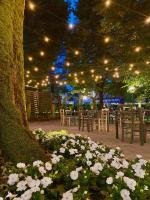 Ogród w obiekcie Hotel Milano Pool & Garden