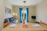 Televízia a/alebo spoločenská miestnosť v ubytovaní Nikos & Vassilis apartments Kefalonia