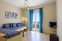 Televízia a/alebo spoločenská miestnosť v ubytovaní Nikos & Vassilis apartments Kefalonia