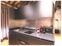 A kitchen or kitchenette at Casa Palacio Rodrigo de la Fuente by Príncipe David - Seis Apartamentos de Lujo -