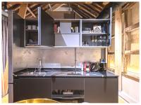 A kitchen or kitchenette at Casa Palacio Rodrigo de la Fuente by Príncipe David - Seis Apartamentos de Lujo -