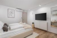 Posteľ alebo postele v izbe v ubytovaní Main Street apartments