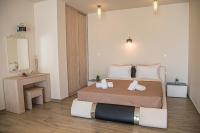 Posteľ alebo postele v izbe v ubytovaní Tereza's Sunset Hotel