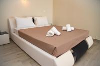 Posteľ alebo postele v izbe v ubytovaní Tereza's Sunset Hotel