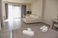 Posteľ alebo postele v izbe v ubytovaní Tereza's Sunset Hotel