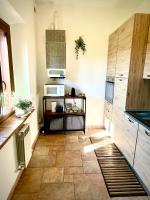 Kuchnia lub aneks kuchenny w obiekcie Appartamento TERRACOTTA nel Podere Gretano