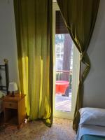 Łóżko lub łóżka w pokoju w obiekcie LA PALAZZINA