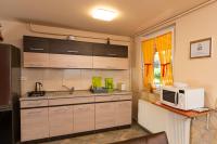 A kitchen or kitchenette at Erika Vendégház