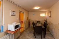 A kitchen or kitchenette at Erika Vendégház