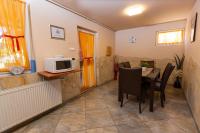A kitchen or kitchenette at Erika Vendégház