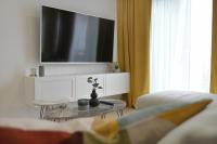 Telewizja i/lub zestaw kina domowego w obiekcie Residence Family Plazina - Place 1 & 2