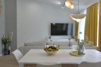 Telewizja i/lub zestaw kina domowego w obiekcie Residence Family Plazina - Place 1 & 2
