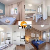 Łóżko lub łóżka w pokoju w obiekcie Prima dell'Elba Family Apartments